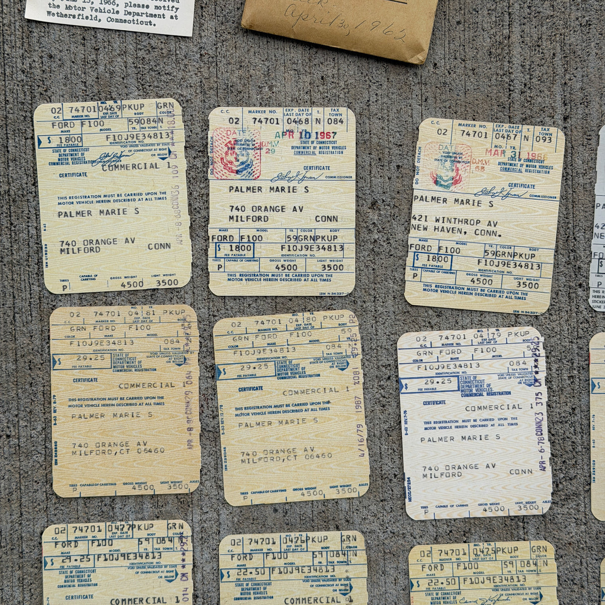 Photo of a 1960 1970 Era Connecticut Ephemera Auto Tag Garage Decor Vintage
 Ford F100 Milford CT Registration Ephemera with original patina