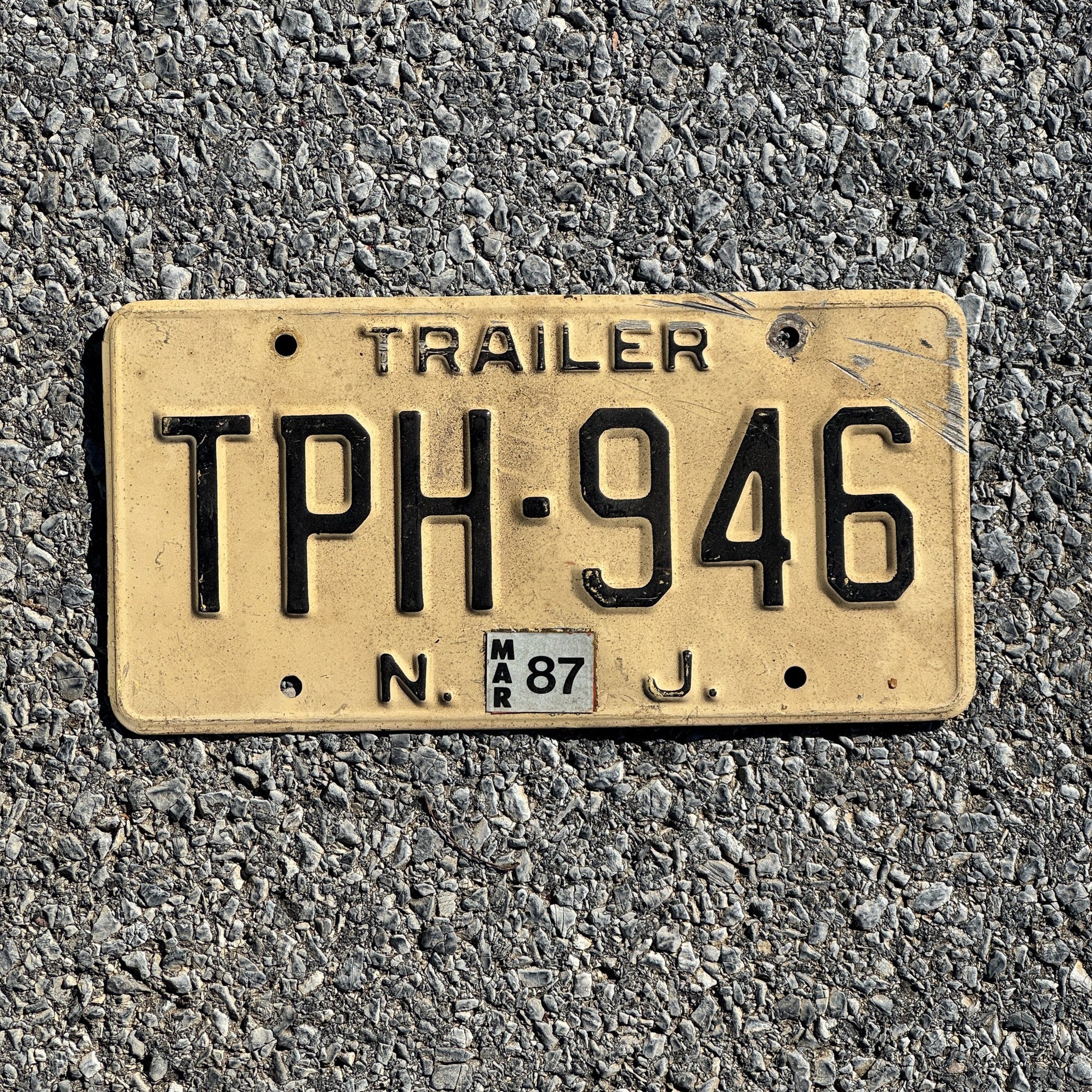 Photo of a 1960 1987 New Jersey Trailer License Plate Auto Tag Garage Decor Vintage TPH 946