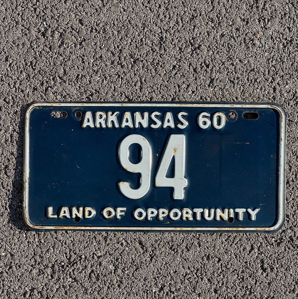 Photo of a 1960 Arkansas License Plate Auto Tag Garage Decor Vintage Low Number Two Digit 94 with original patina