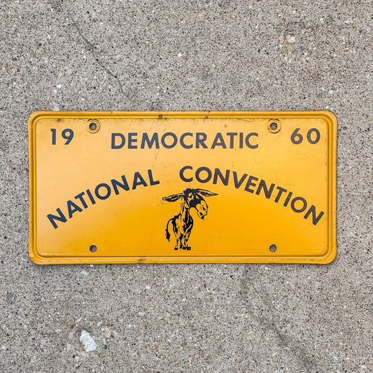 Photo of a 1960 California Booster License Plate Auto Tag Garage Decor Vintage Los Angeles Politics Political Democratic National Convention with original patina