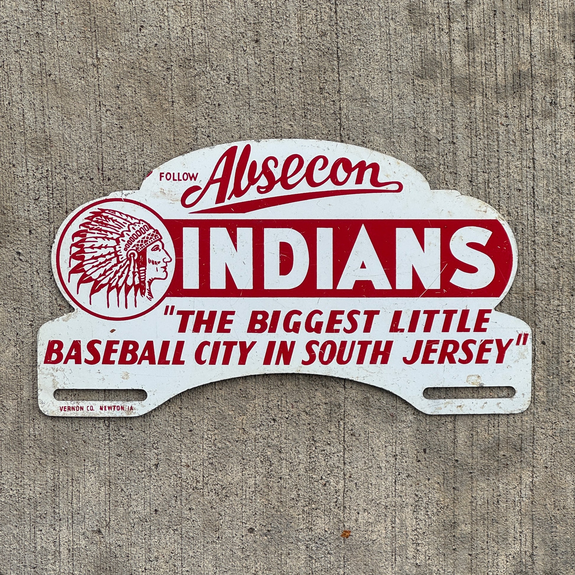 Photo of a 1960 Era Absecon New Jersey License Plate Topper Auto Tag Garage Decor Vintage Native American Indians Baseball City with original patina