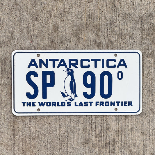 Photo of a 1960 Era Antarctica License Plate Auto Tag Garage Decor Vintage US Navy Operation Deep Freeze McMurdo Station Penguin SP 90 with original patina