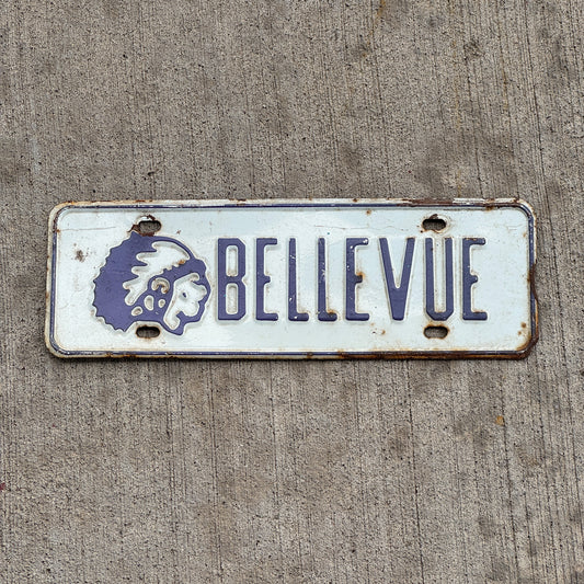 Photo of a 1960 Era Bellevue Chieftans Nebraska License Plate Topper Auto Tag Garage Decor Vintage High School with original patina