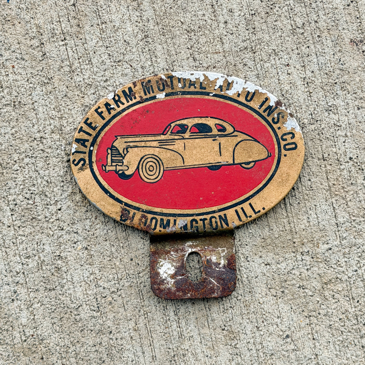 Photo of a 1960 Era Bloomington Illinois License Plate Topper Auto Tag Garage Decor Vintage with original patina