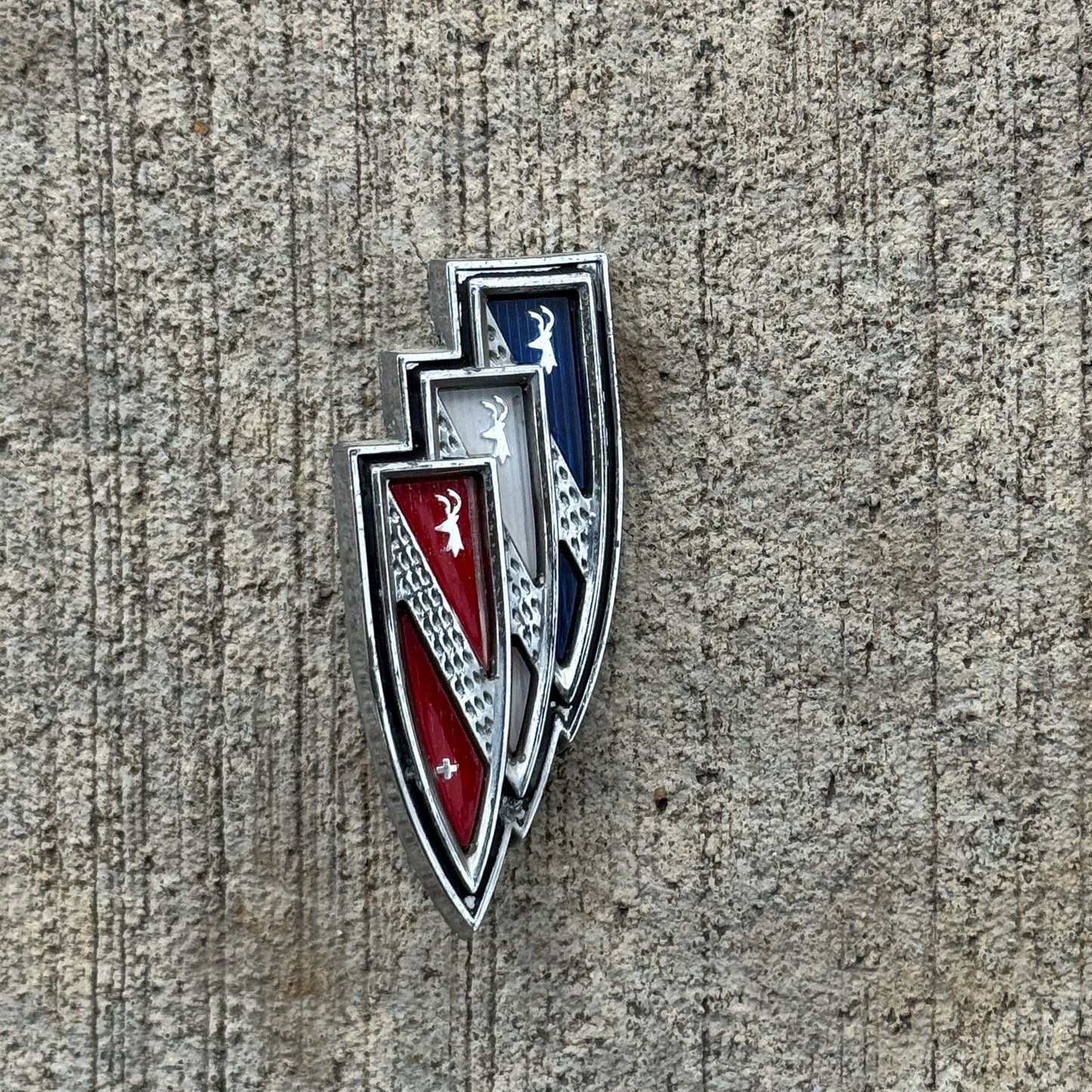 Photo of a 1960 Era Buick Tri Shield Grill Badge Emblem Auto Tag Garage Decor Vintage Ornament Skylark Wagon with original patina