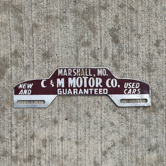 Photo of a 1960 Era C & M Motor Co Marshall Missouri License Plate Topper Auto Tag Garage Decor Vintage with original patina