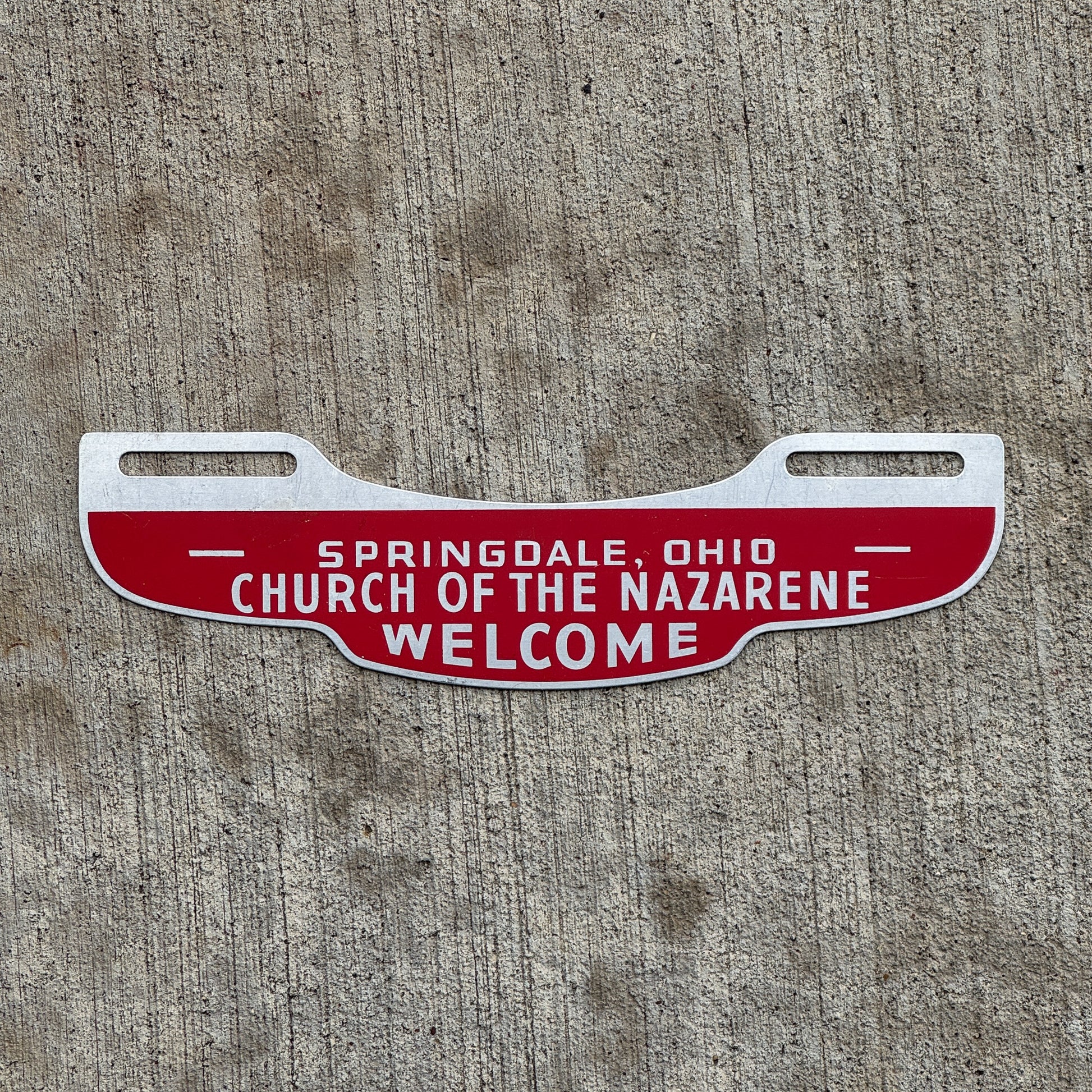 Photo of a 1960 Era Church of Nazarene Springdale Ohio License Plate Topper Auto Tag Garage Decor Vintage Springfield OH with original patina