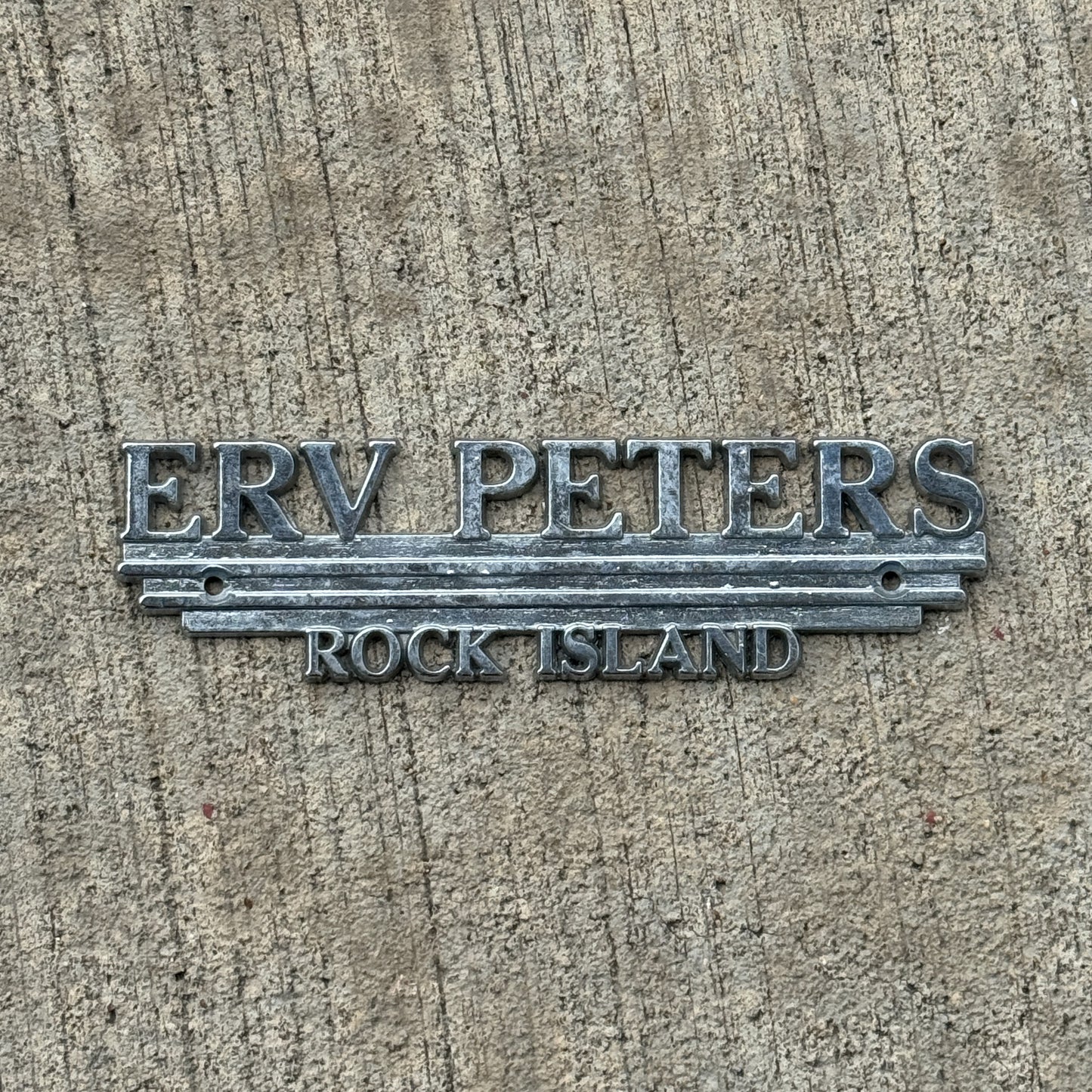 Photo of a 1960 Era Erv Peters Rock Island Illinois Dealer Badge Emblem Auto Tag Garage Decor Vintage Dodge Dealership with original patina