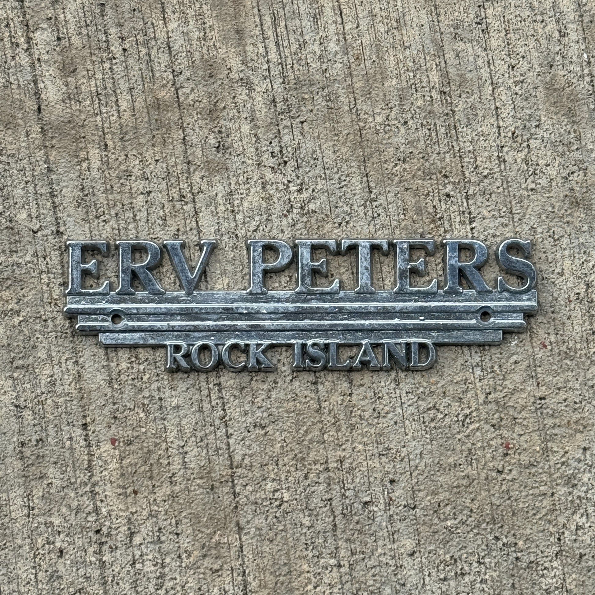 Photo of a 1960 Era Erv Peters Rock Island Illinois Dealer Badge Emblem Auto Tag Garage Decor Vintage Dodge Dealership with original patina