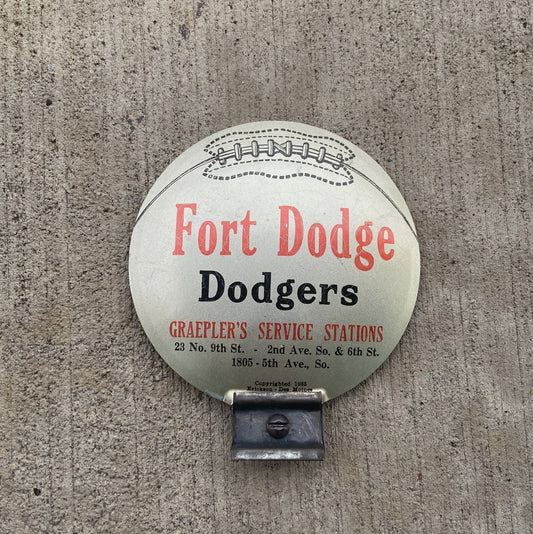 Photo of a 1960 Era Fort Dodge Iowa License Plate Topper Auto Tag Garage Decor Vintage Amazing Basketball Graphic Dodgers with original patina