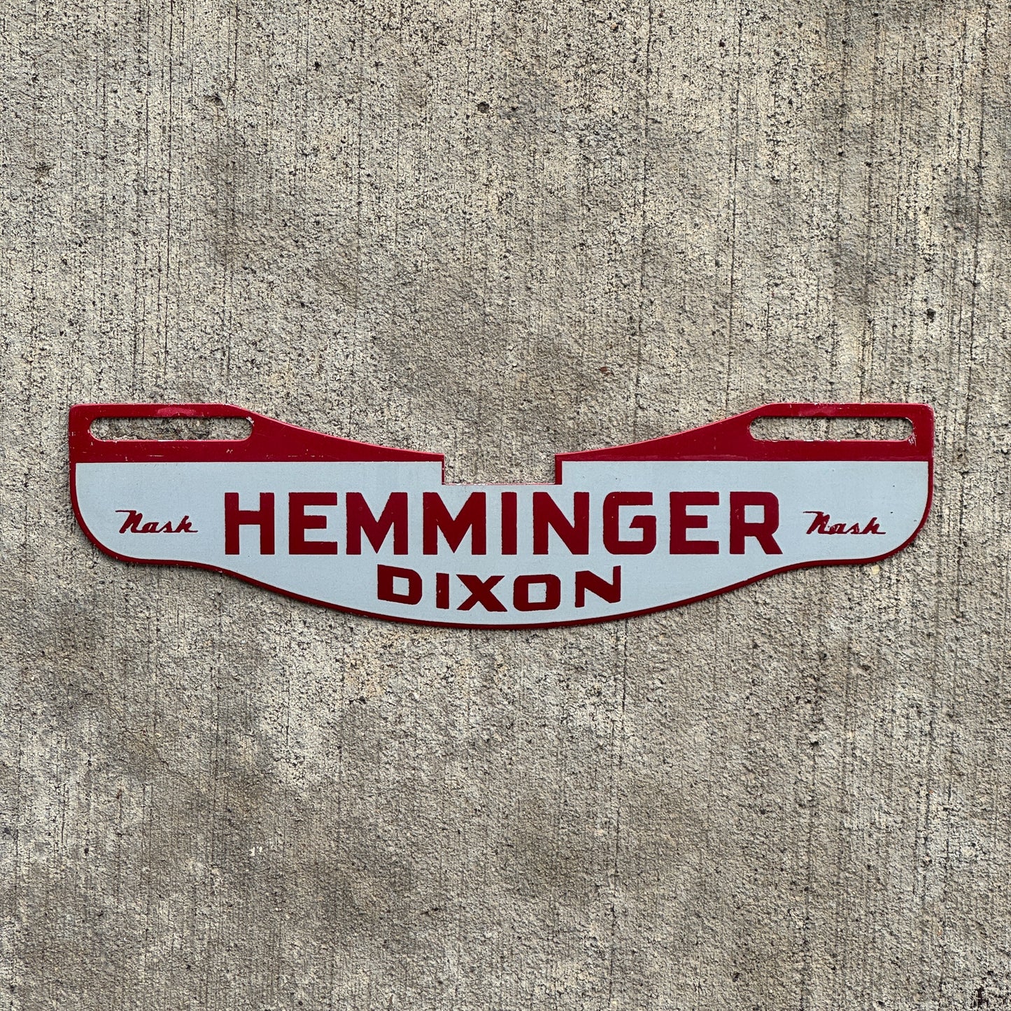 Photo of a 1960 Era Hemminger Nash Dixon Illinois License Plate Topper Auto Tag Garage Decor Vintage Dealer Dealership with original patina