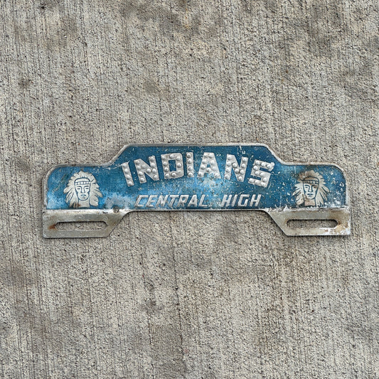 Photo of a 1960 Era Indians Central High School St Joseph Missouri License Plate Topper Auto Tag Garage Decor Vintage with original patina