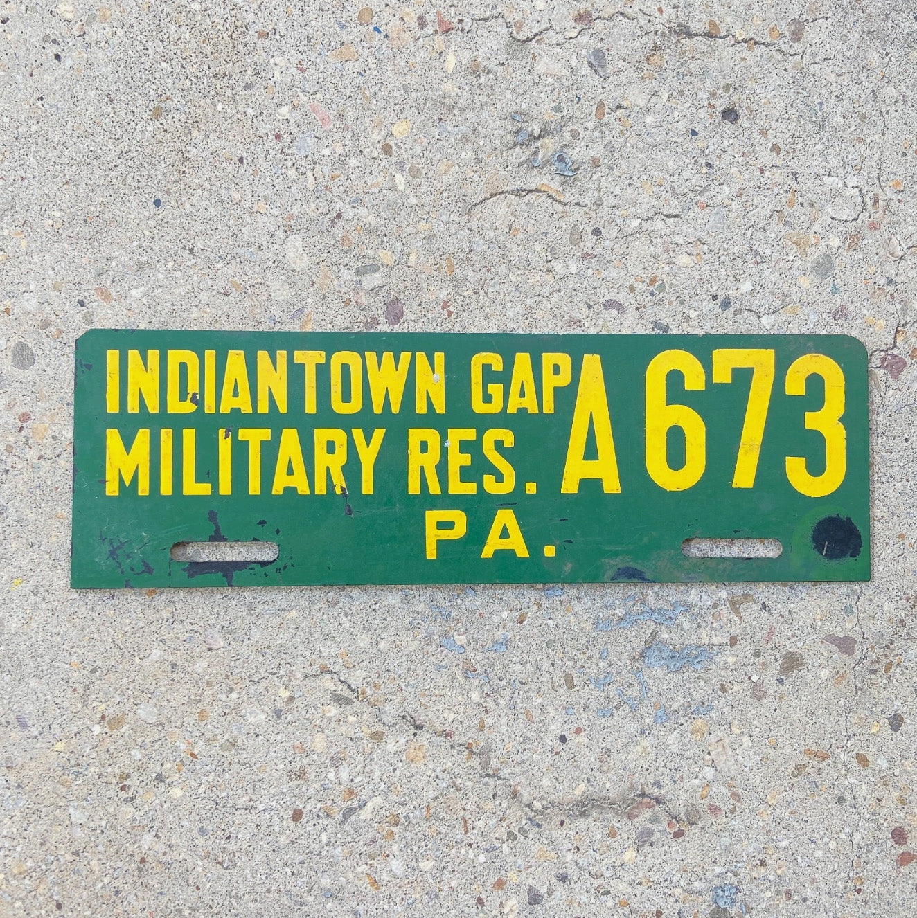 Photo of a 1960 Era Indiantown Gap Pennsylvania License Plate Topper Auto Tag Garage Decor Vintage Military Fort FIG with original patina
