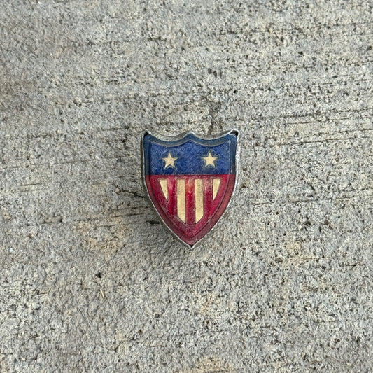 Photo of a 1960 Era Kastar American Flag Shield License Plate Topper Auto Tag Garage Decor Vintage Reflector Jewel Plastic with original patina