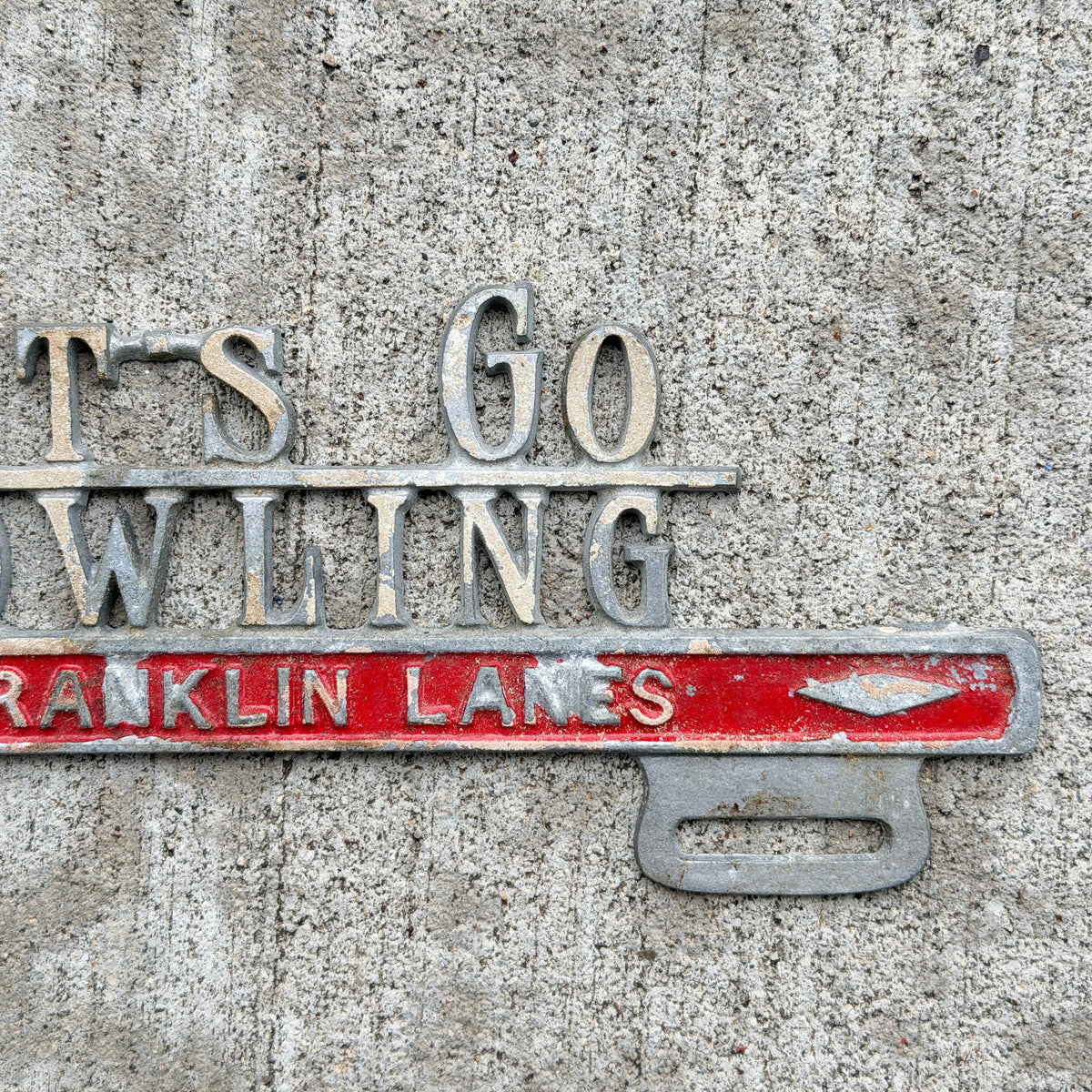 Photo of a 1960 Era Let's Go Bowling Franklin Lanes Evansville Indiana License Plate Topper Auto Tag Garage Decor Vintage Cast Aluminum Original with original patina