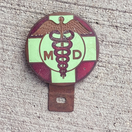 Photo of a 1960 Era Medical Doctor License Plate Topper Auto Tag Garage Decor Vintage Vintage Wall Decor Nurse Caduceus with original patina