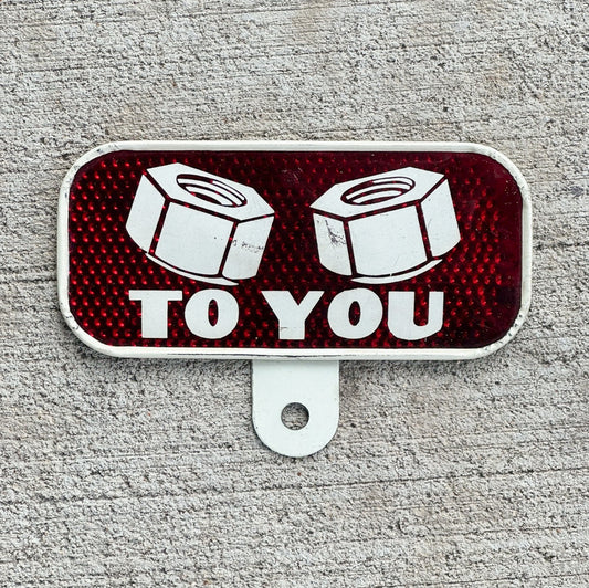 1960 Era Nuts to You License Plate Topper Auto Tag Red Reflective Tool Pun Snow Craggs