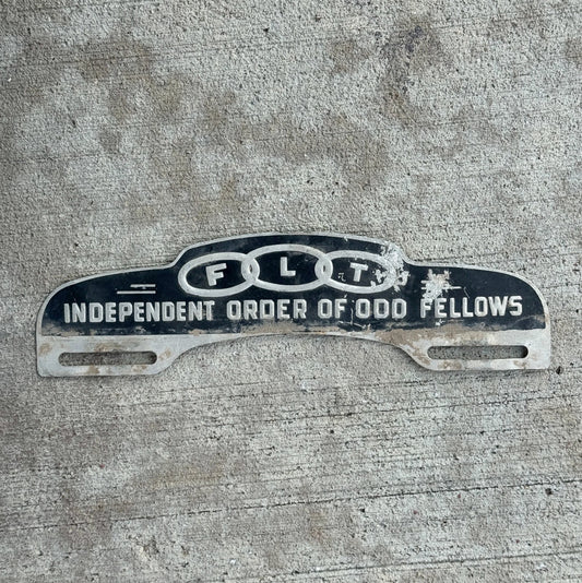 Photo of a 1960 Era Odd Fellows License Plate Topper Auto Tag Garage Decor Vintage Vintage Fraternal Order IOOF FLT with original patina