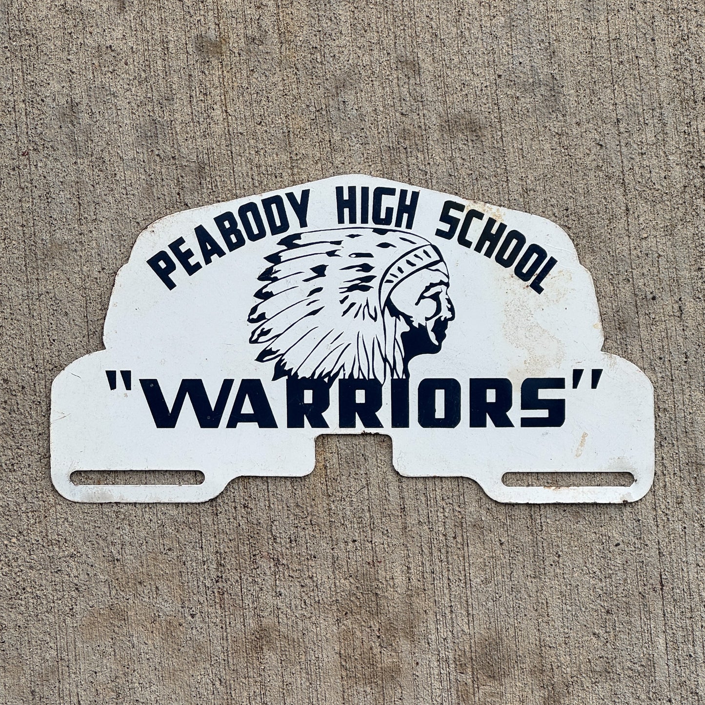 Photo of a 1960 Era Peabody High School Warriors Kansas License Plate Topper Auto Tag Garage Decor Vintage Native American Indian Graphic with original patina