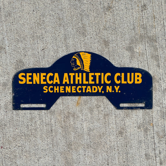 Photo of a 1960 Era Seneca Athletic Club Schenectady New York License Plate Topper Auto Tag Garage Decor Vintage Native American Indian with original patina