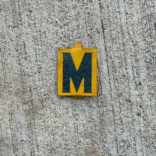 Photo of a 1960 Era Sunoco Gas Oil Arrow License Plate Topper Auto Tag Garage Decor Vintage Letter M Insert Initials Name with original patina