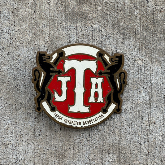 Photo of a 1960 Era Toyopeter Association Japan Badge Emblem License Plate Topper Auto Tag Garage Decor Vintage JTA with original patina
