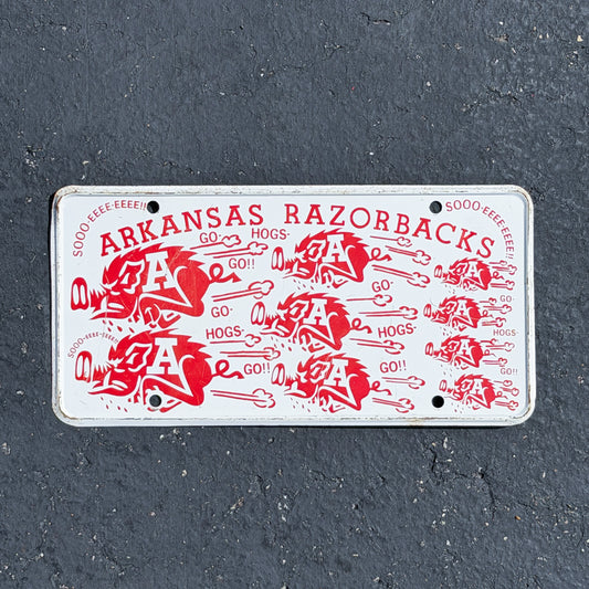 Photo of a 1960 Era University of Arkansas Booster License Plate Auto Tag Garage Decor Vintage
 Razorbacks College Sports Football Steel with original patina
