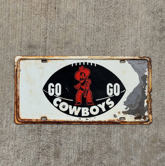 Photo of a 1960 Era University of Oklahoma Booster License Plate Auto Tag Garage Decor Vintage Football Metal with original patina