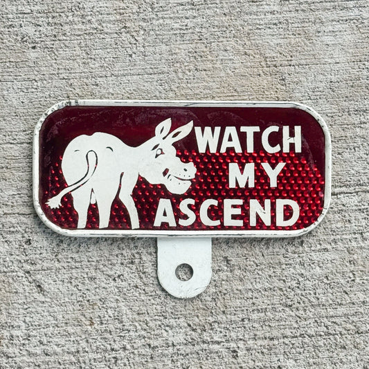 1960 Era Watch My Ascend License Plate Topper Auto Tag Red Reflective Donkey Pun Snow Craggs