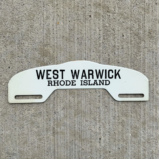 Photo of a 1960 Era West Warwick Rhode Island License Plate Topper Auto Tag Garage Decor Vintage Black White Auto Garage with original patina