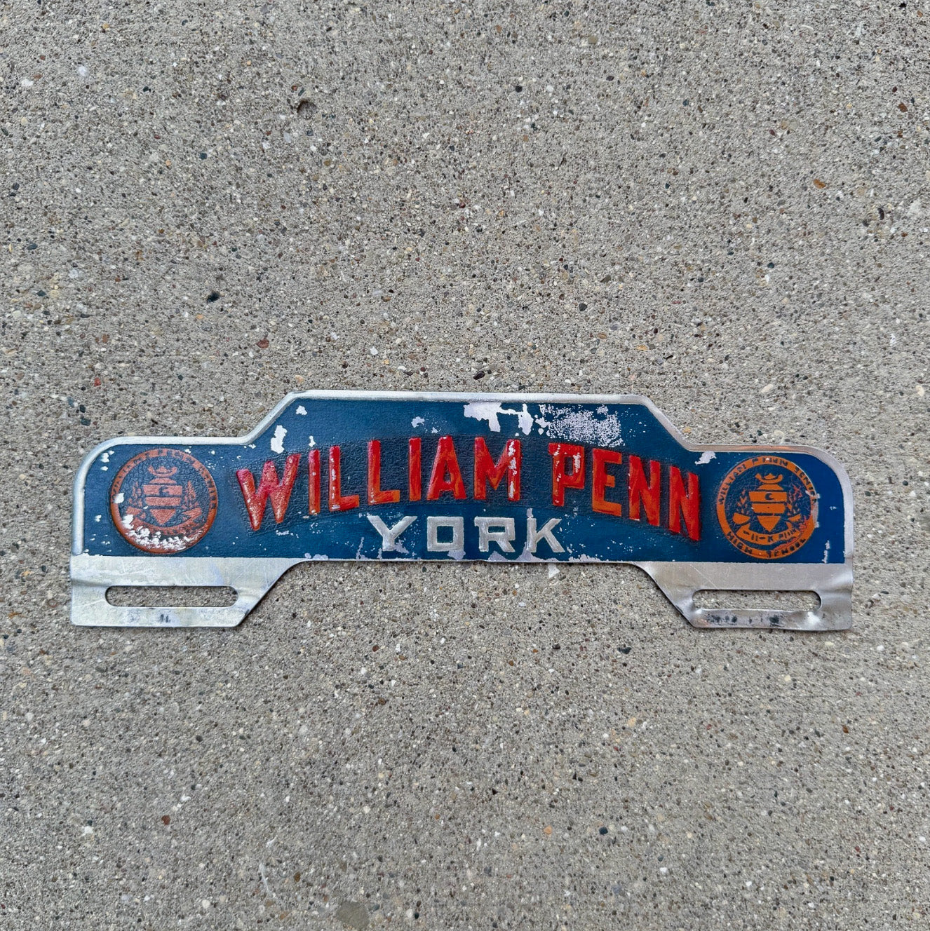 Photo of a 1960 Era William Penn York Pennsylvania License Plate Topper Auto Tag Garage Decor Vintage High School with original patina