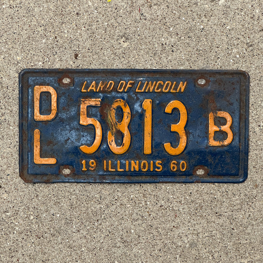 Photo of a 1960 Illinois Dealer License Plate Auto Tag 1 Vintage Garage Orange Blue 5813 B with original patina