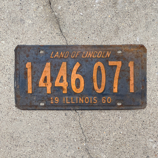 Photo of a 1960 Illinois License Plate Auto Tag 1 Vintage Garage Orange Blue 1 446 071 with original patina