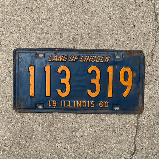 Photo of a 1960 Illinois License Plate Auto Tag 1 Vintage Garage Orange Blue 113 319 with original patina