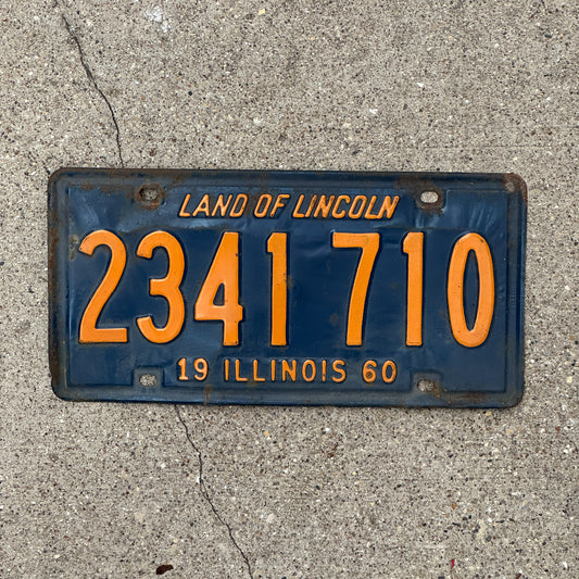Photo of a 1960 Illinois License Plate Auto Tag 1 Vintage Garage Orange Blue 2 341 710 with original patina