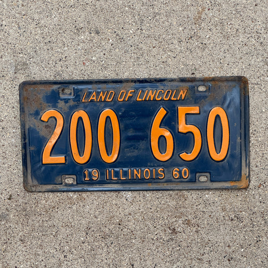 Photo of a 1960 Illinois License Plate Auto Tag 1 Vintage Garage Orange Blue 200 650 with original patina