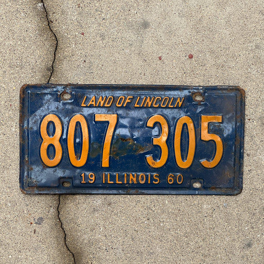 Photo of a 1960 Illinois License Plate Auto Tag 1 Vintage Garage Orange Blue 807 305 with original patina