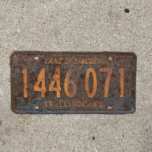Photo of a 1960 Illinois License Plate Auto Tag 2 Vintage Garage Orange Blue 1 446 071 with original patina