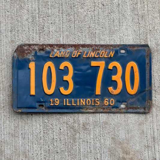 Photo of a 1960 Illinois License Plate Auto Tag 2 Vintage Garage Orange Blue 103 730 with original patina