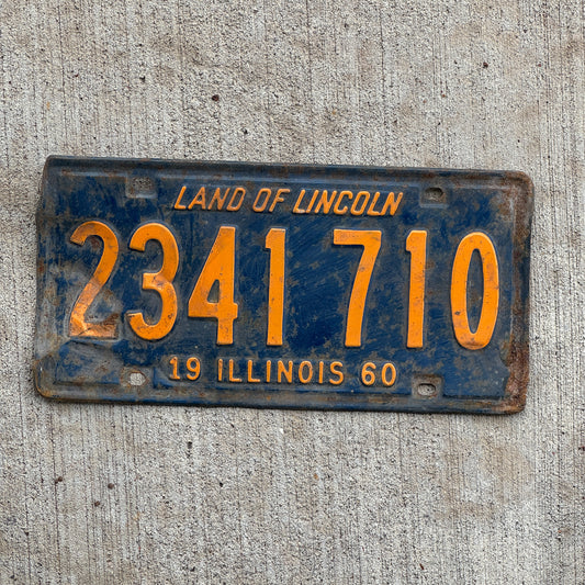 Photo of a 1960 Illinois License Plate Auto Tag 2 Vintage Garage Orange Blue 2 341 710 with original patina