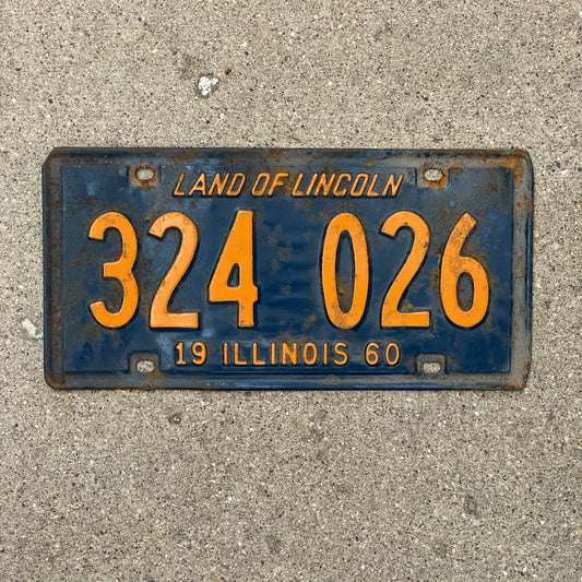 Photo of a 1960 Illinois License Plate Auto Tag 2 Vintage Garage Orange Blue 324 026 with original patina
