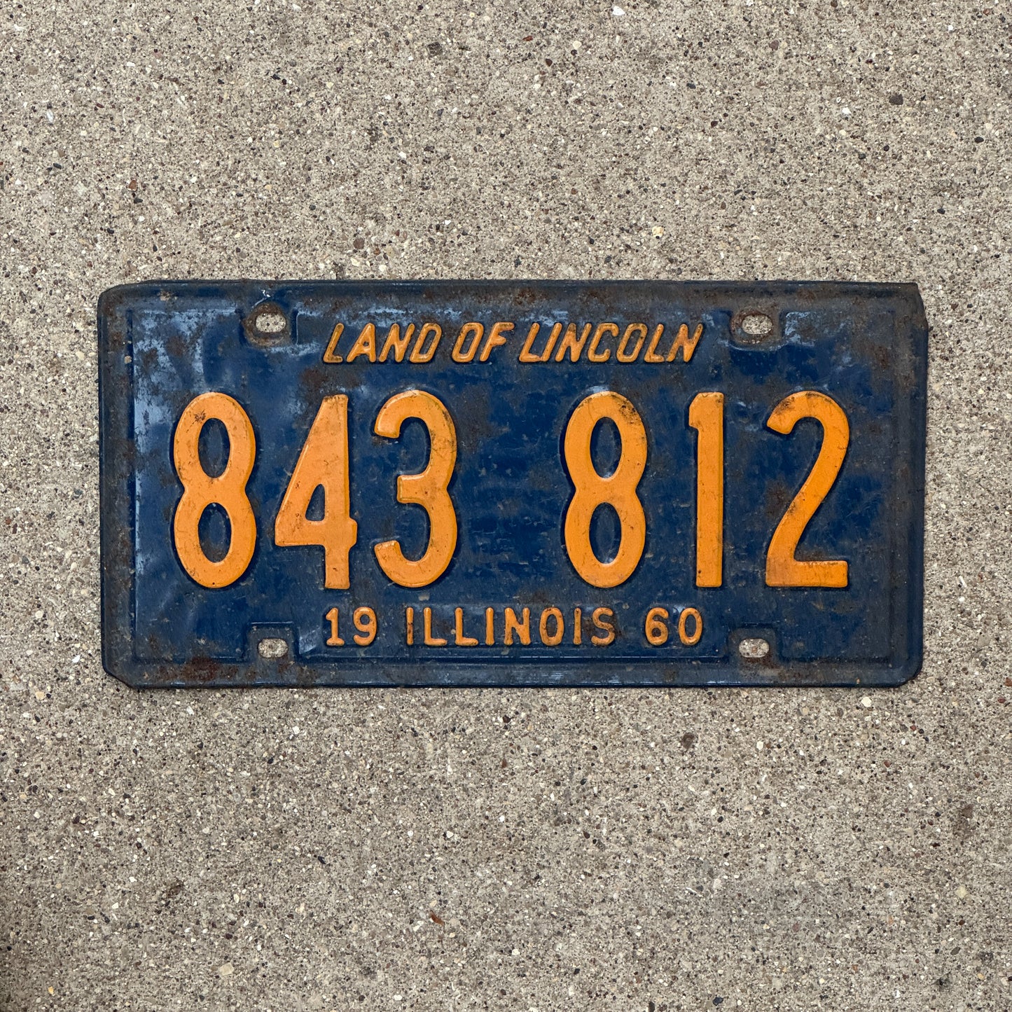 Photo of a 1960 Illinois License Plate Auto Tag 2 Vintage Garage Orange Blue 843 812 with original patina