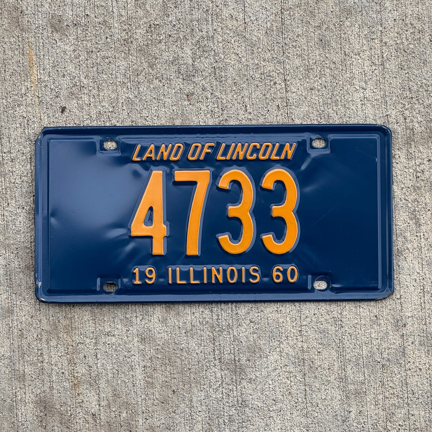 Photo of a 1960 Illinois License Plate Auto Tag Garage Decor Vintage Low Number Four Digit 4733 with original patina