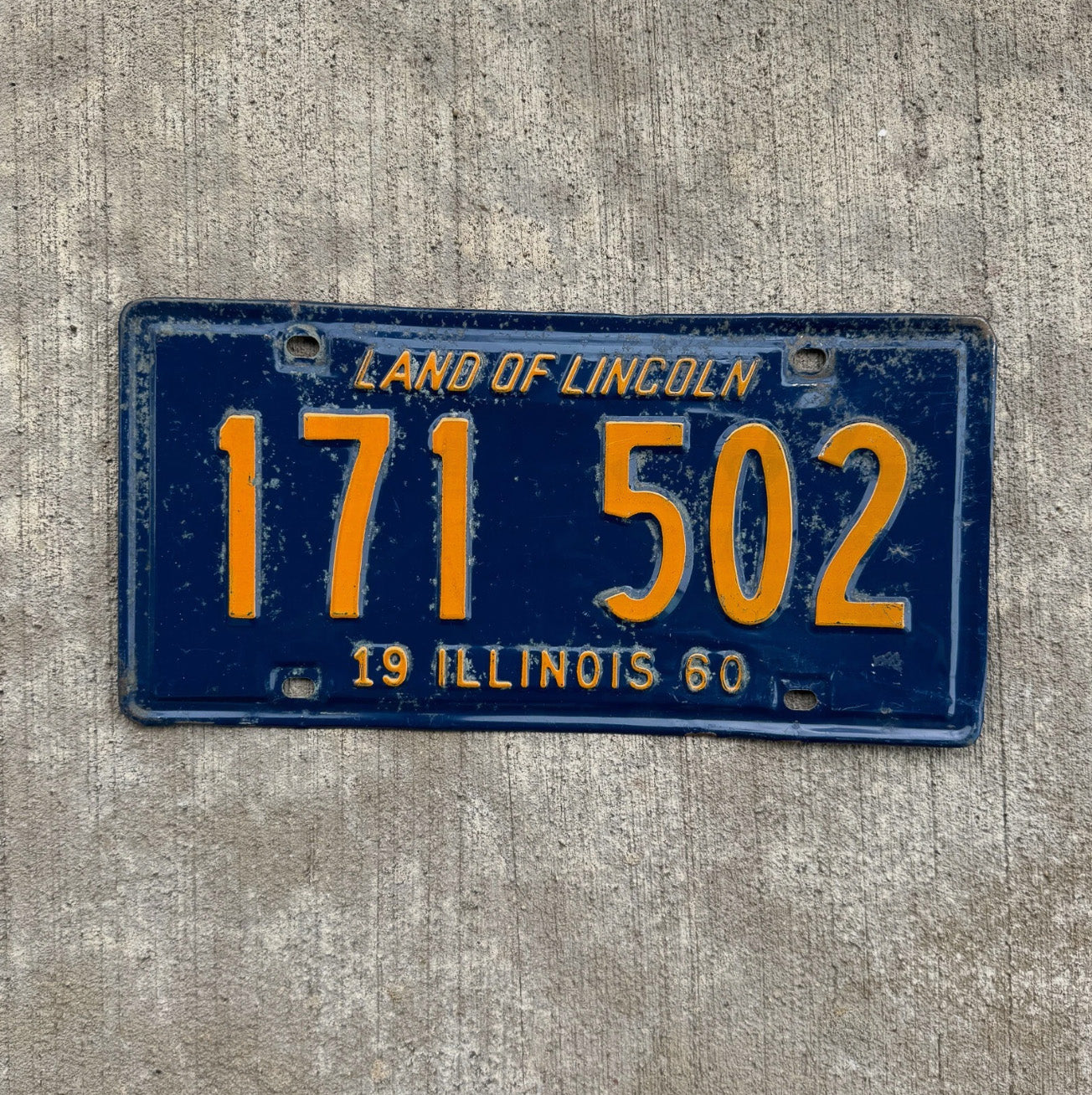 Photo of a 1960 Illinois License Plate Auto Tag Garage Decor Vintage Orange Blue 171 502
