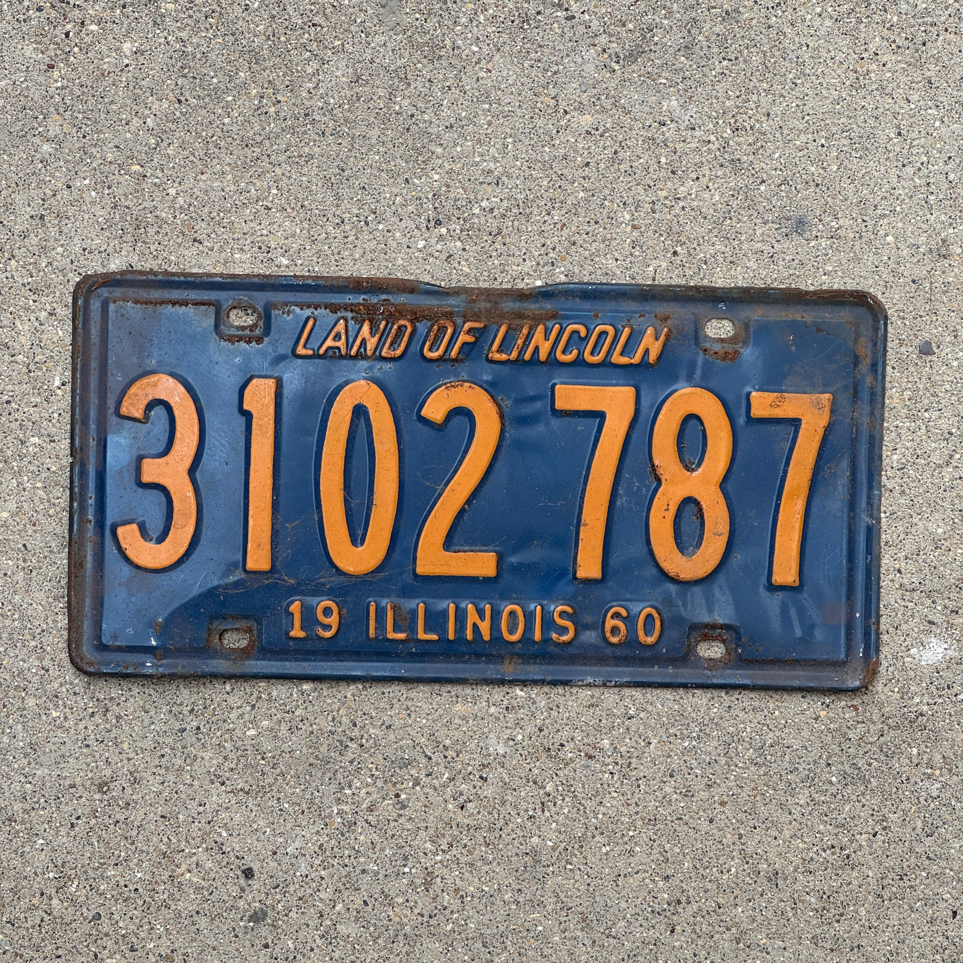 Photo of a 1960 Illinois License Plate Auto Tag Garage Decor Vintage Orange Blue 3102 787 with original patina