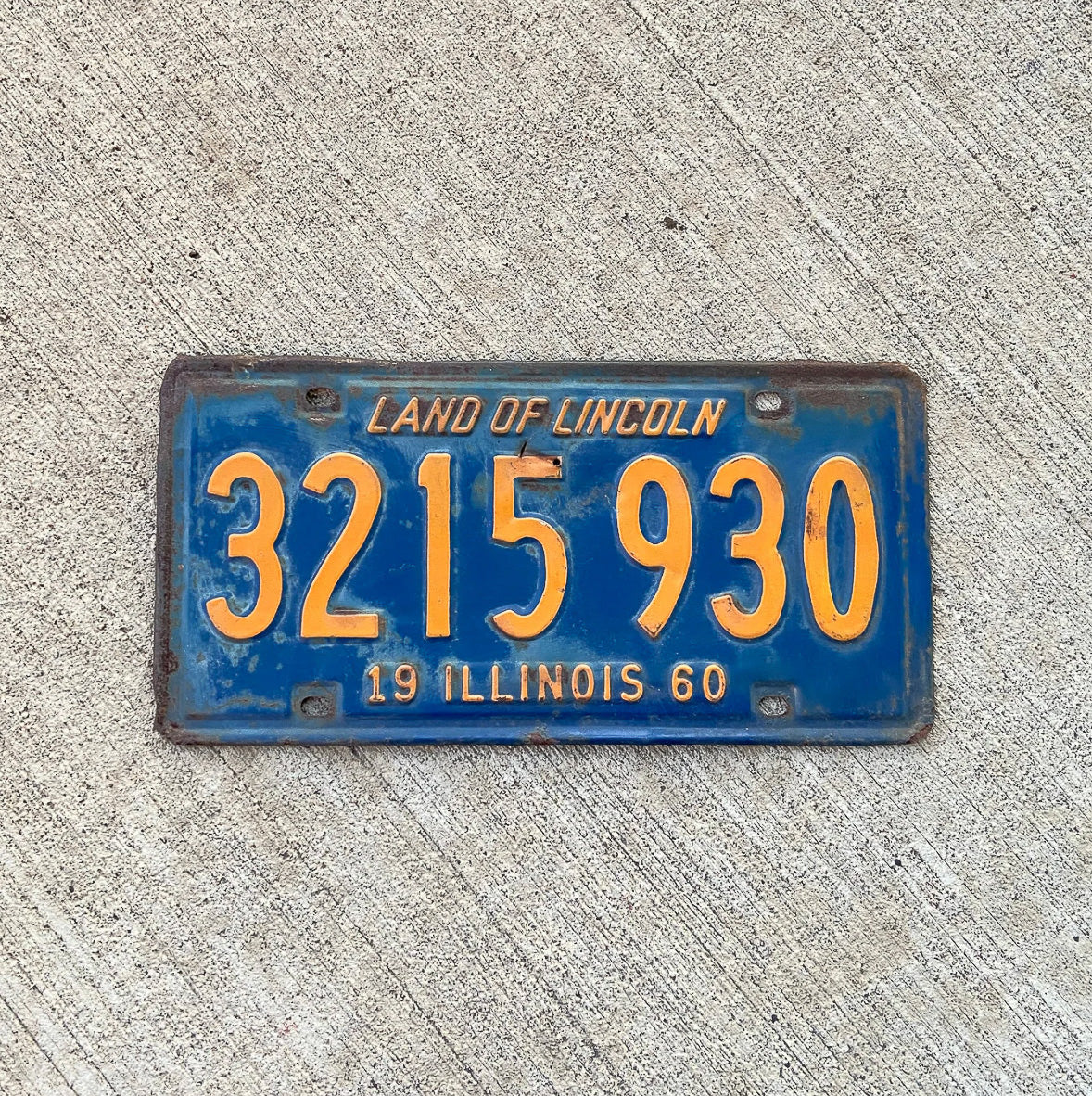 Photo of a 1960 Illinois License Plate Auto Tag Garage Decor Vintage Orange Blue 3215 930 with original patina