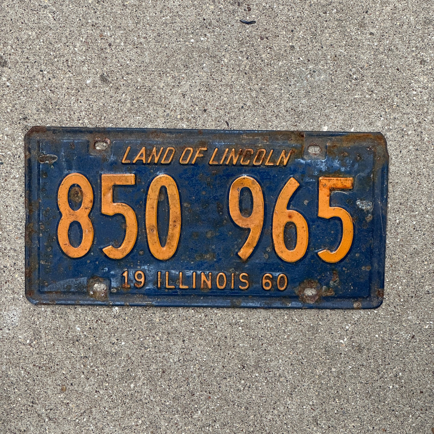 Photo of a 1960 Illinois License Plate Auto Tag Garage Decor Vintage Orange Blue 850 965 with original patina