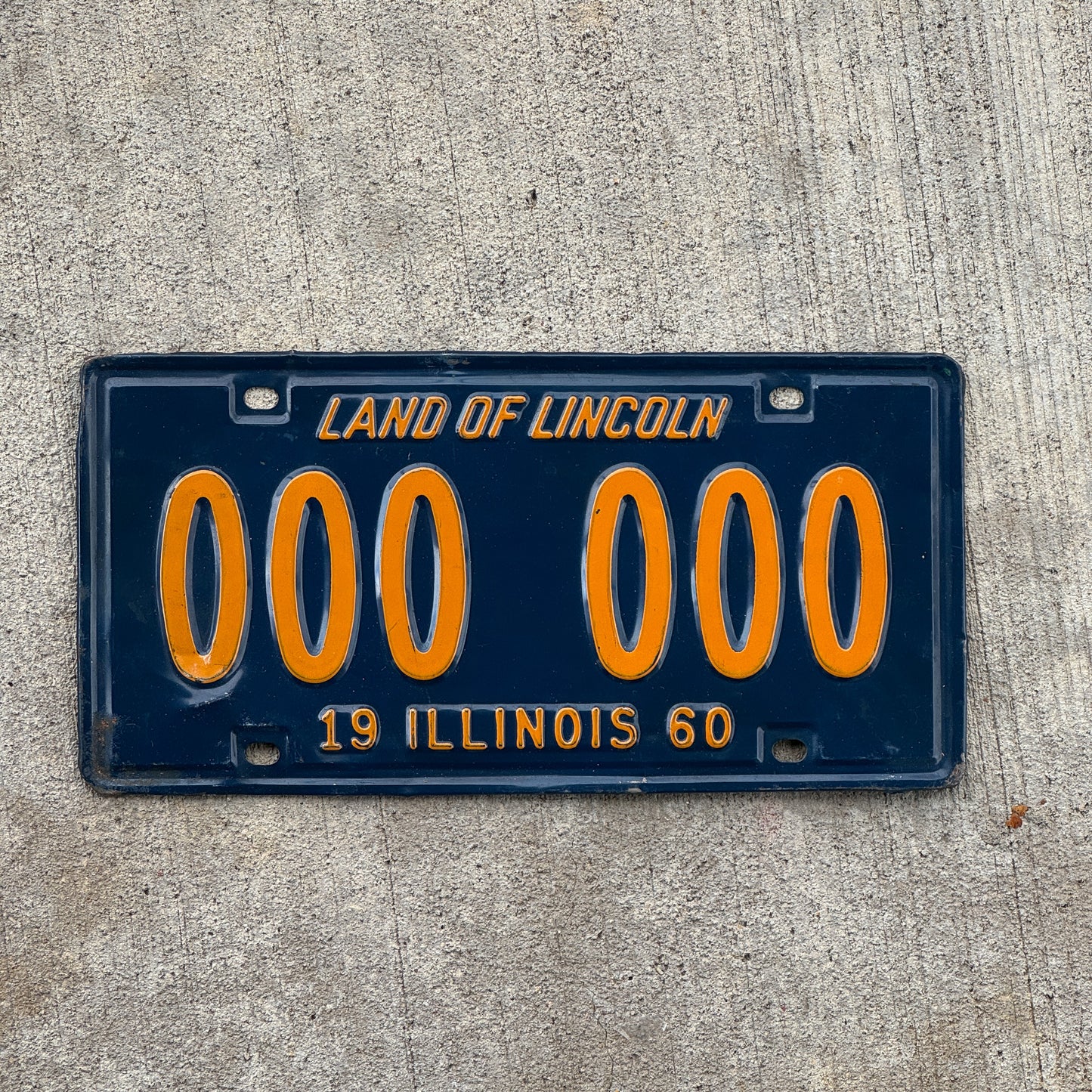 Photo of a 1960 Illinois Sample License Plate Auto Tag Garage Decor Vintage 000 000 with original patina