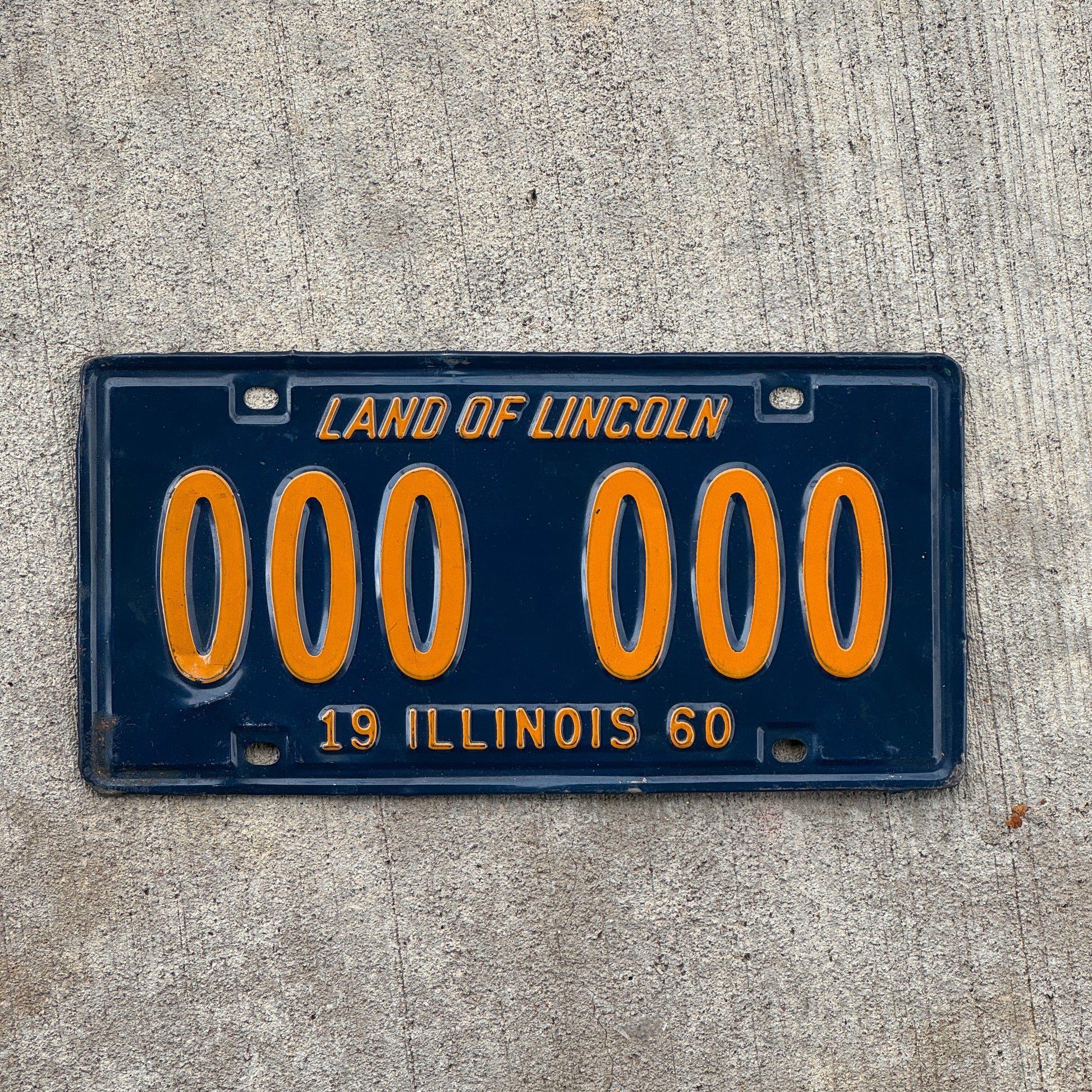 Photo of a 1960 Illinois Sample License Plate Auto Tag Garage Decor Vintage 000 000 with original patina
