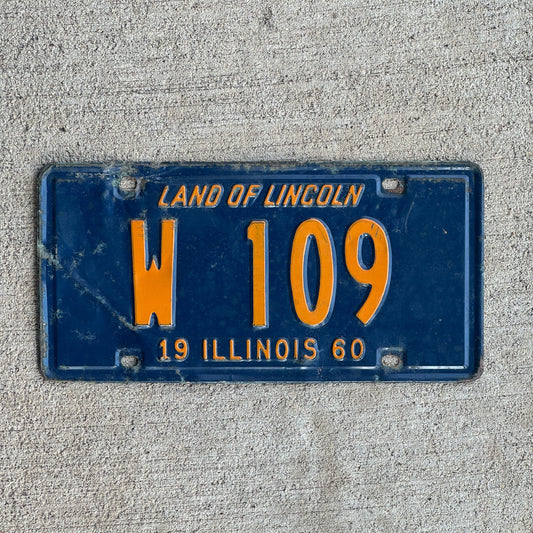 Photo of a 1960 Illinois Trailer License Plate Auto Tag Garage Decor Vintage Low Number Three Digit W 109 with original patina